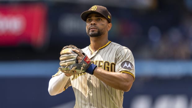 Padres infielder Xander Bogaerts looks on while in the field during a game.